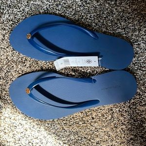 Tory Burch navy flip flops new with tags never worn